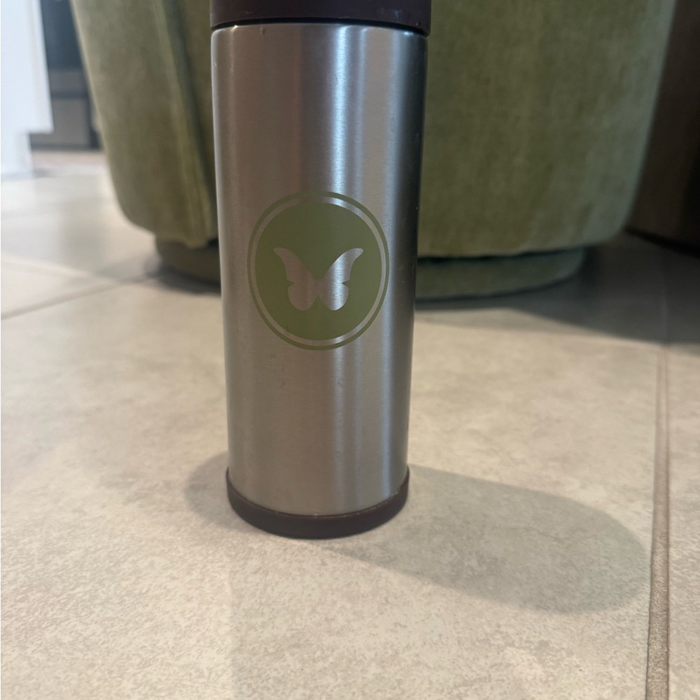 Teavana Silver and Black Travel Thermos with Butterfly Emblem
